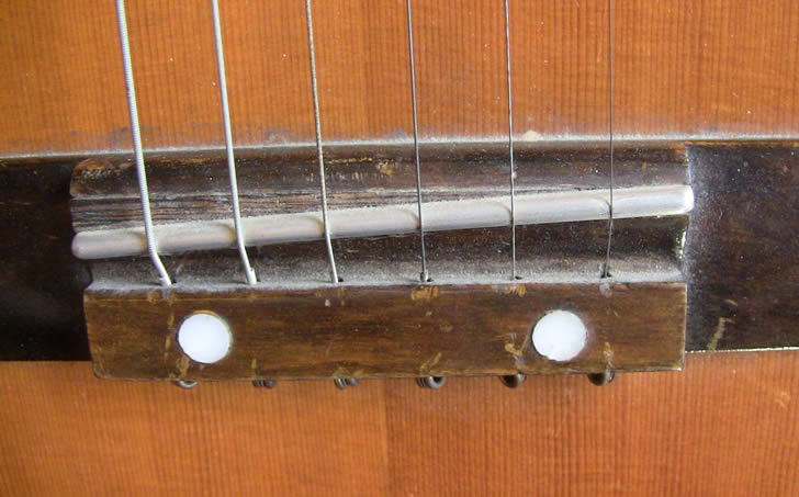 Acoustic guitar bridge